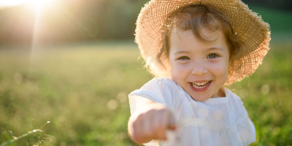 Happy toddler out in the fresh air